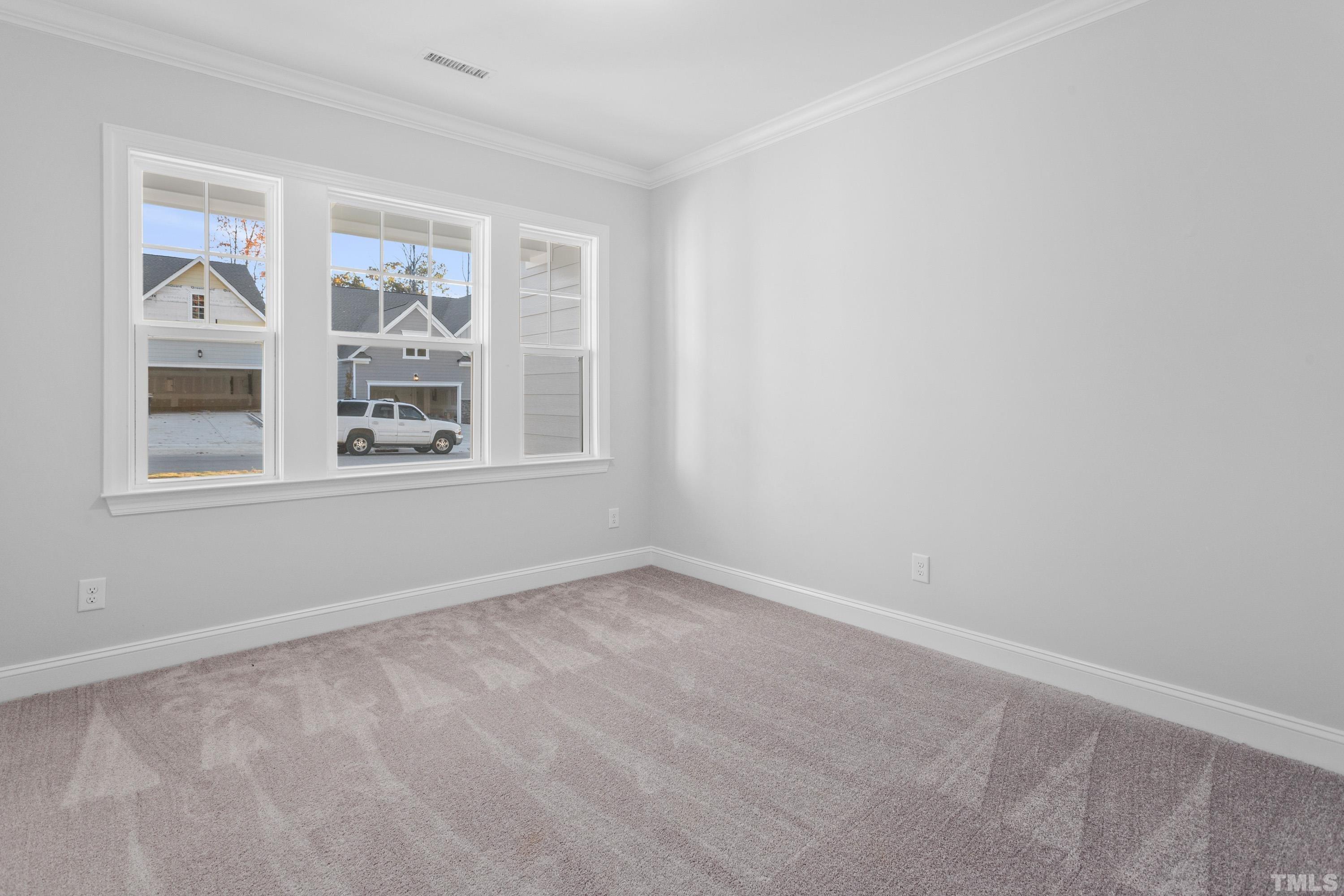 137 English Violet Lane Raleigh, NC 27610 - Photo 17 of 27 an empty room with windows
