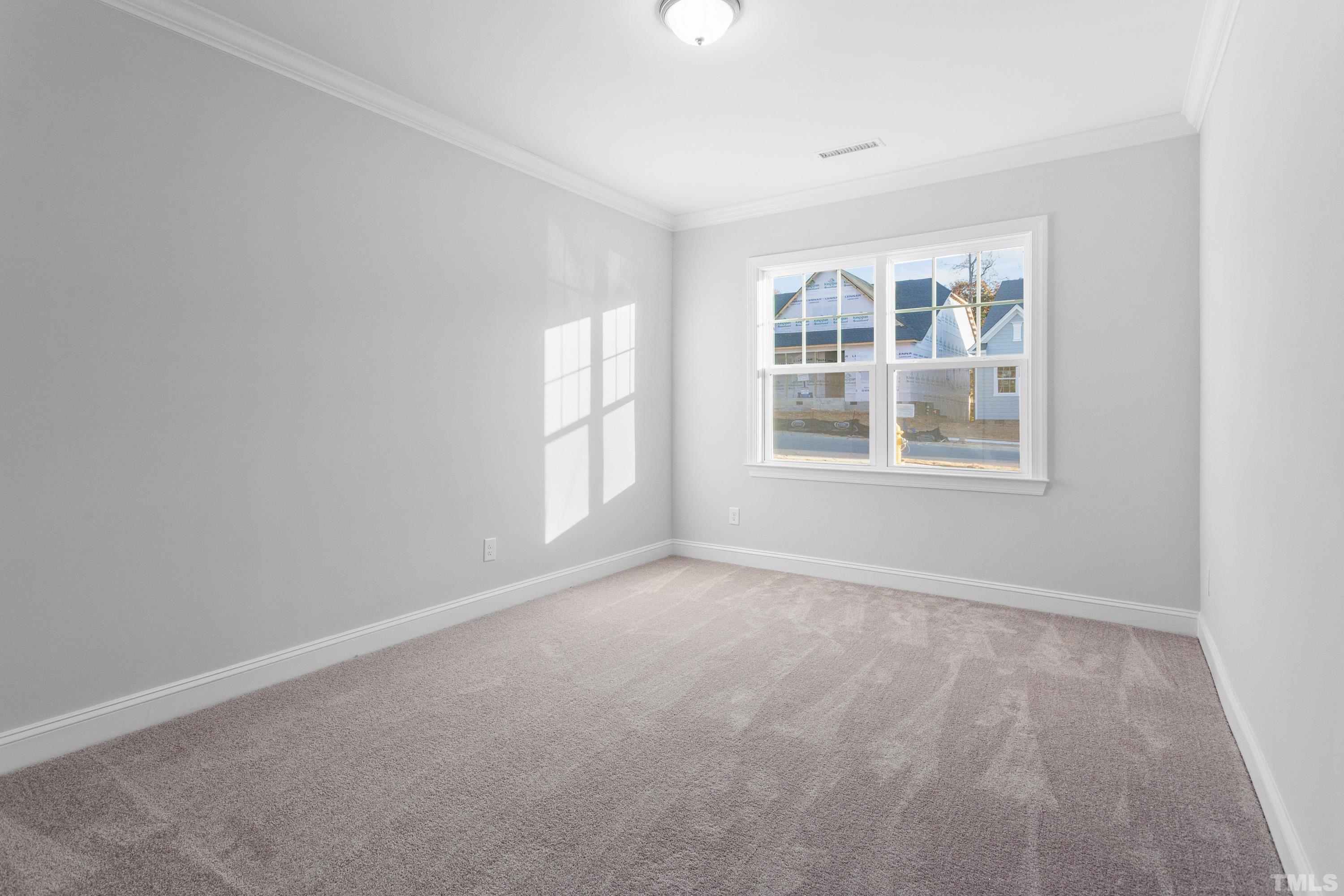 137 English Violet Lane Raleigh, NC 27610 - Photo 19 of 27 an empty room with windows