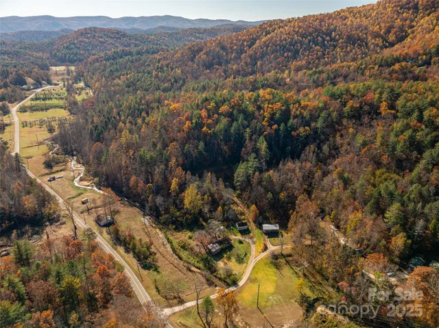 an aerial view of residential house with parking space