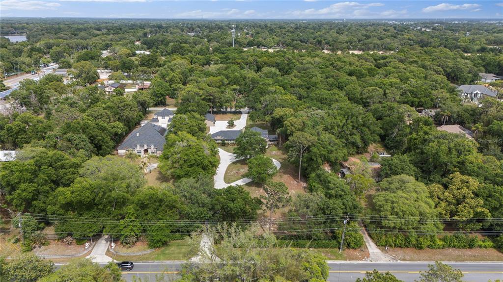 891 Markham Woods Road Longwood, FL 32779 - Photo 55 of 56 a view of a city with lush green forest
