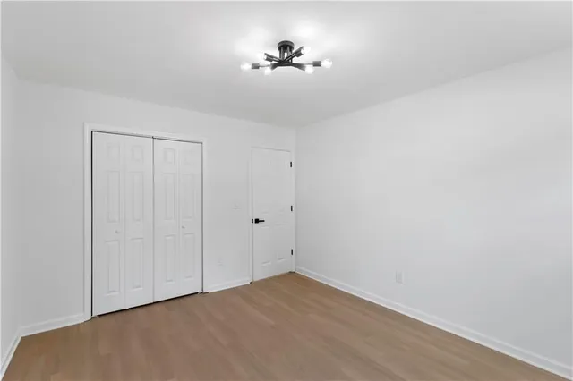 a view of hallway with closet