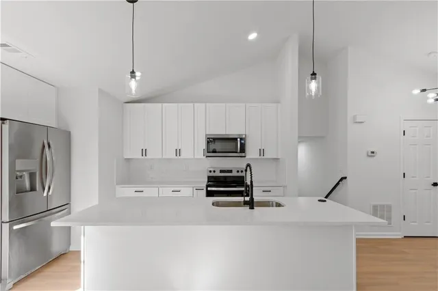a view of a hallway with front door