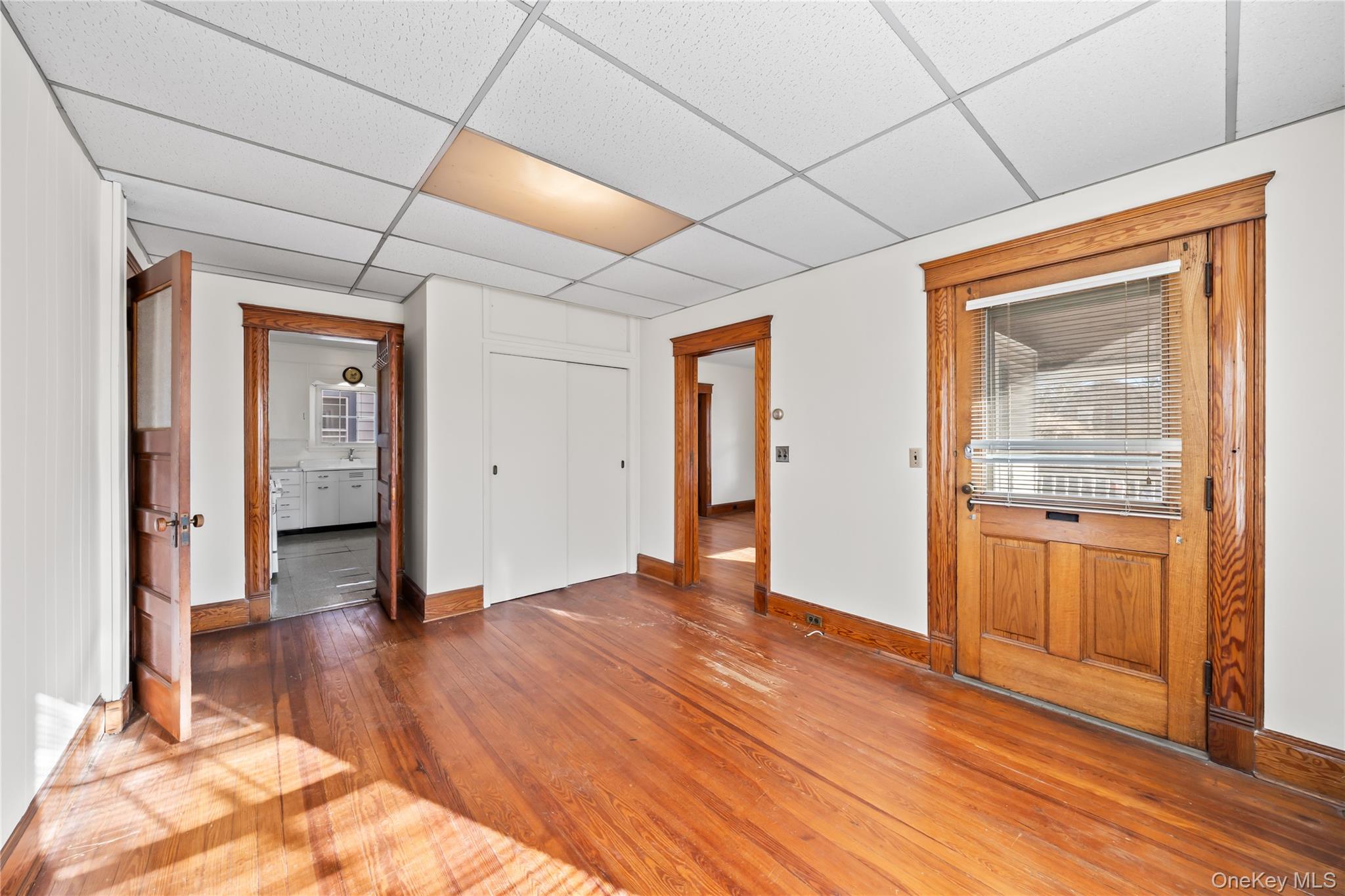 47 Prairie Avenue Suffern, NY 10901 - Photo 13 of 45 a view of an empty room with wooden floor and a window