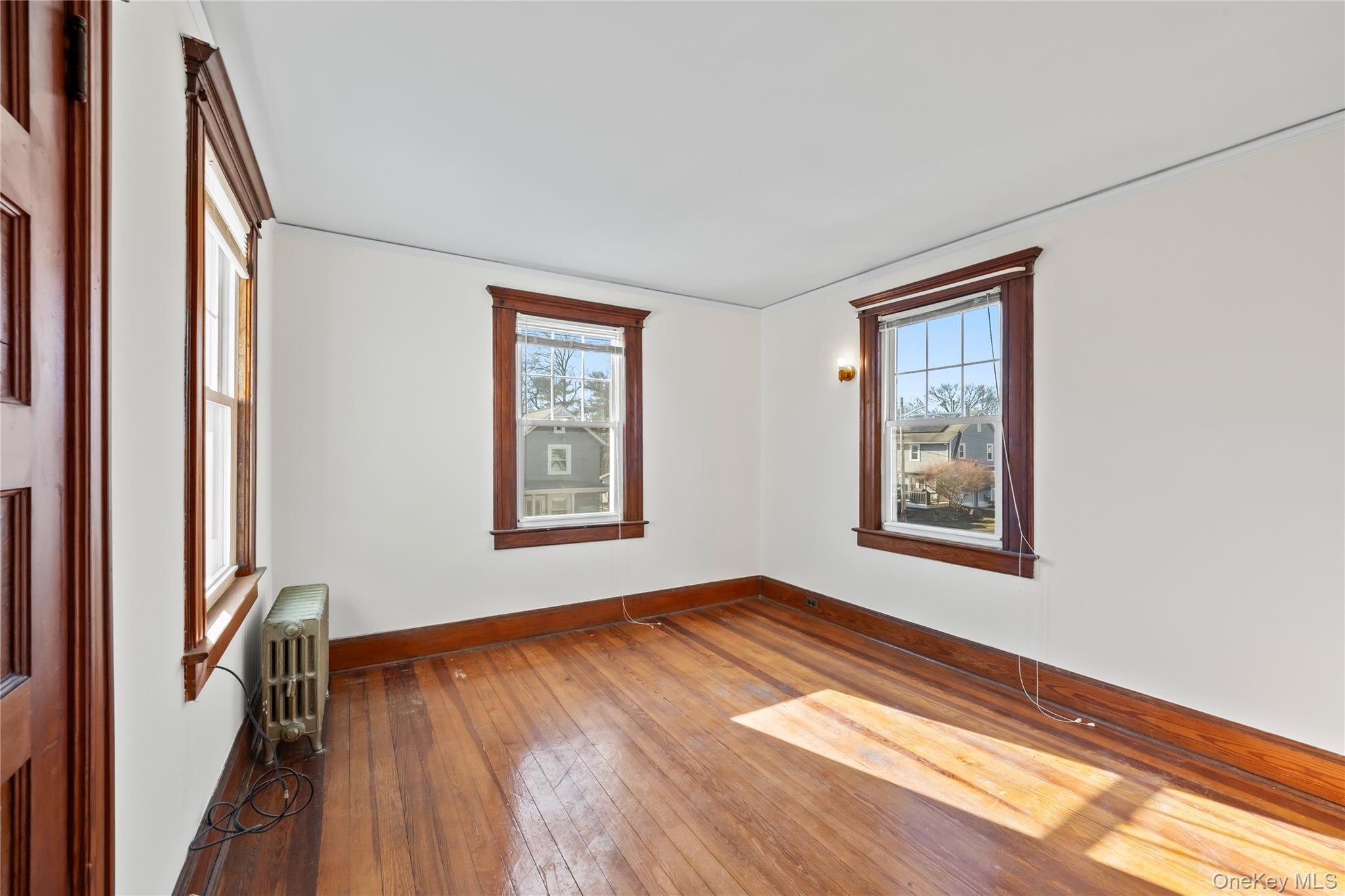 47 Prairie Avenue Suffern, NY 10901 - Photo 22 of 45 a view of a room with wooden floor and a window
