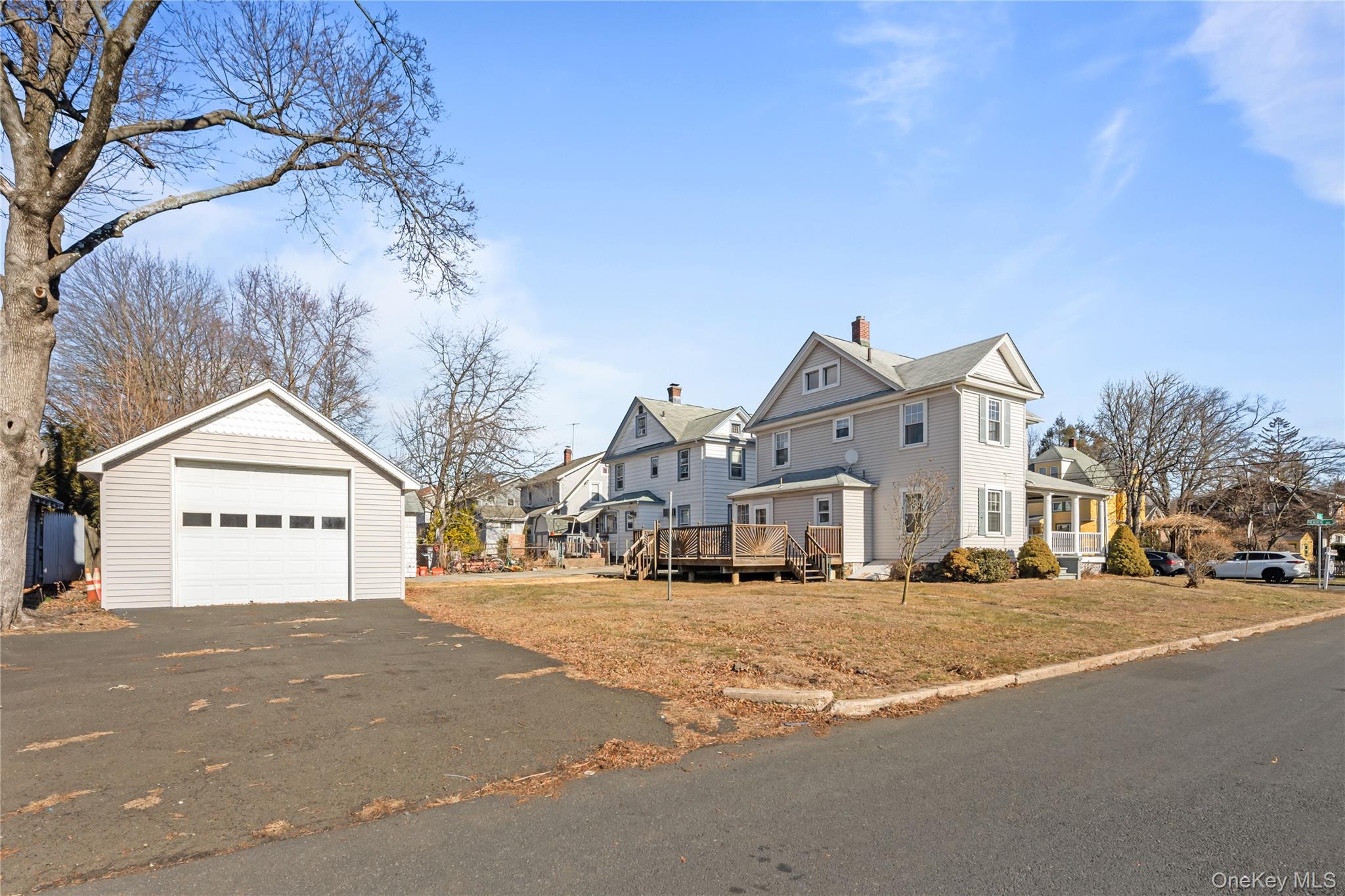 47 Prairie Avenue Suffern, NY 10901 - Photo 34 of 45 a sign board on the side of a street