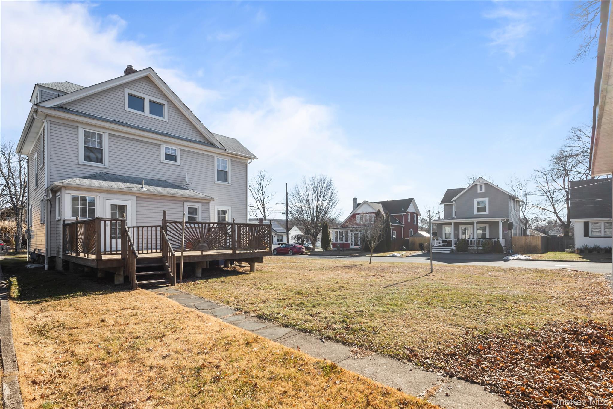 47 Prairie Avenue Suffern, NY 10901 - Photo 36 of 45 a front view of a house with a yard covered with snow