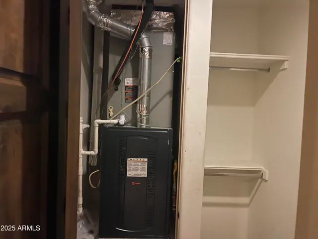 a room with furniture and wooden floor