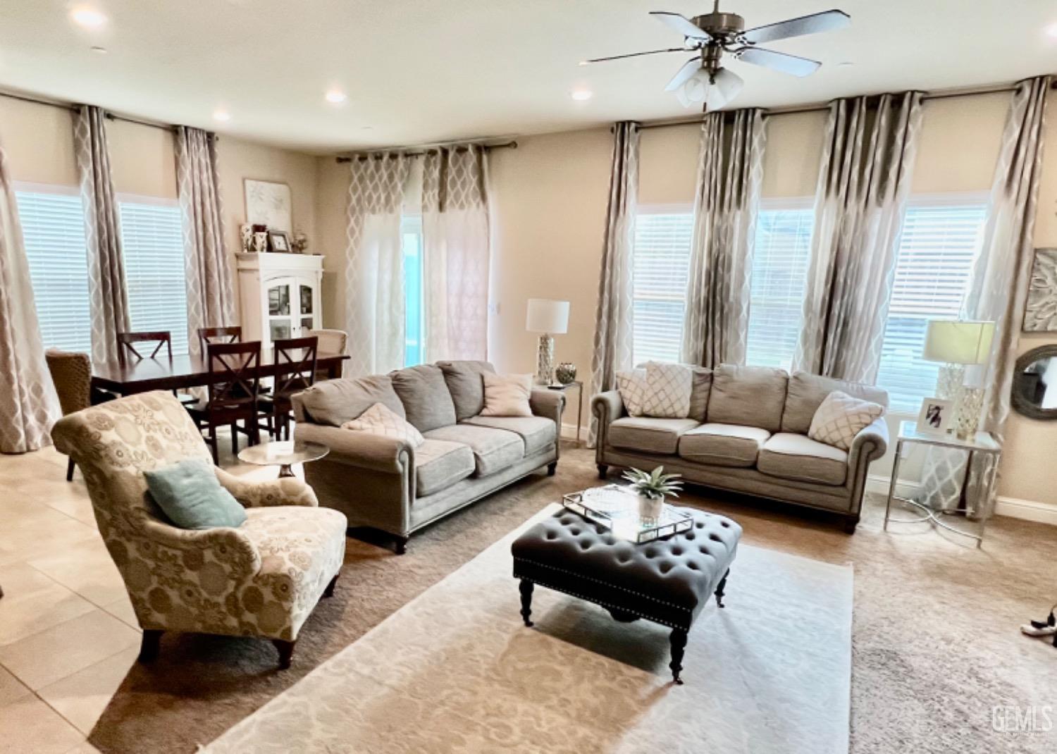 Undisclosed Address Bakersfield, CA 93311 - Photo 28 of 63 a living room with furniture and a large window