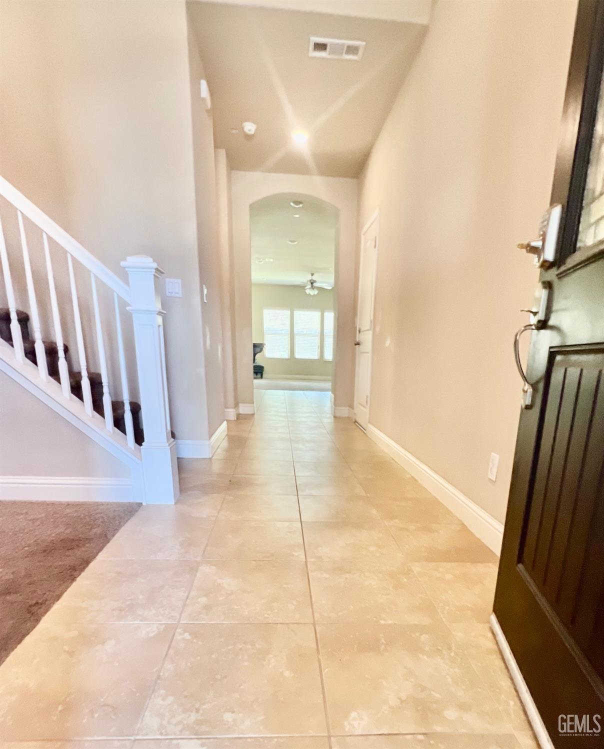 Undisclosed Address Bakersfield, CA 93311 - Photo 5 of 63 a view of hallway with stairs