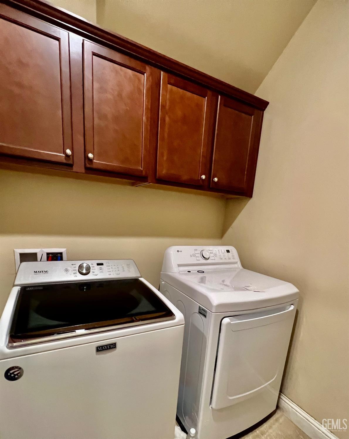 Undisclosed Address Bakersfield, CA 93311 - Photo 57 of 63 a utility room with dryer and washer