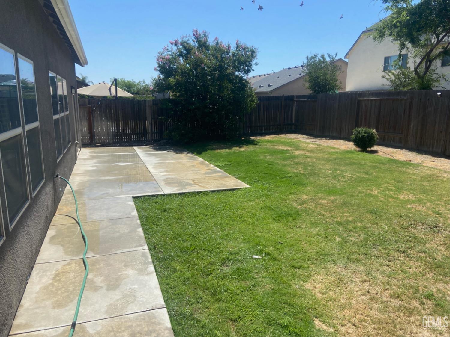 Undisclosed Address Bakersfield, CA 93311 - Photo 59 of 63 a view of a backyard