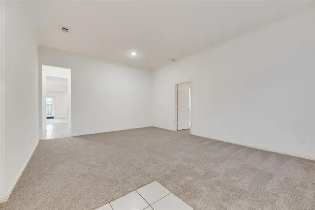 an empty room with an entryway