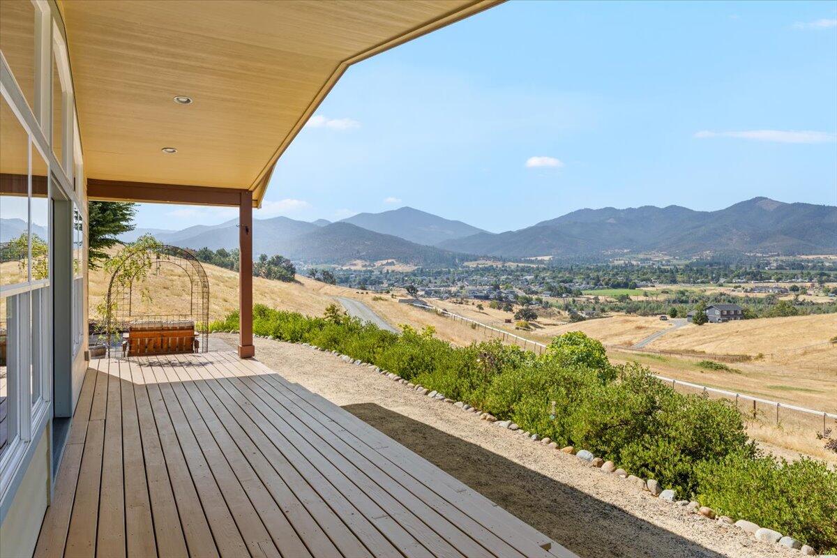 4856 Payne Road Medford, OR 97504 - Photo 12 of 49 Covered porch with panoramic valley, city and mountain view