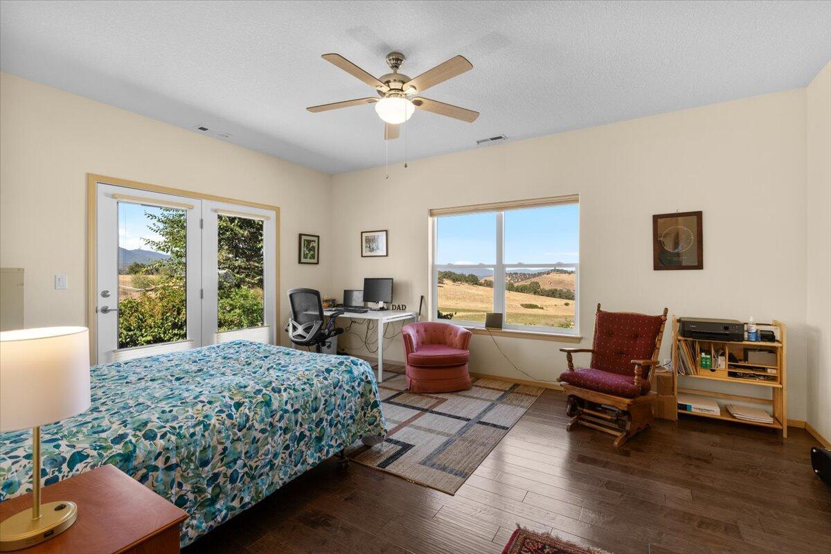 4856 Payne Road Medford, OR 97504 - Photo 29 of 49 Primary bedroom with French doors to patio