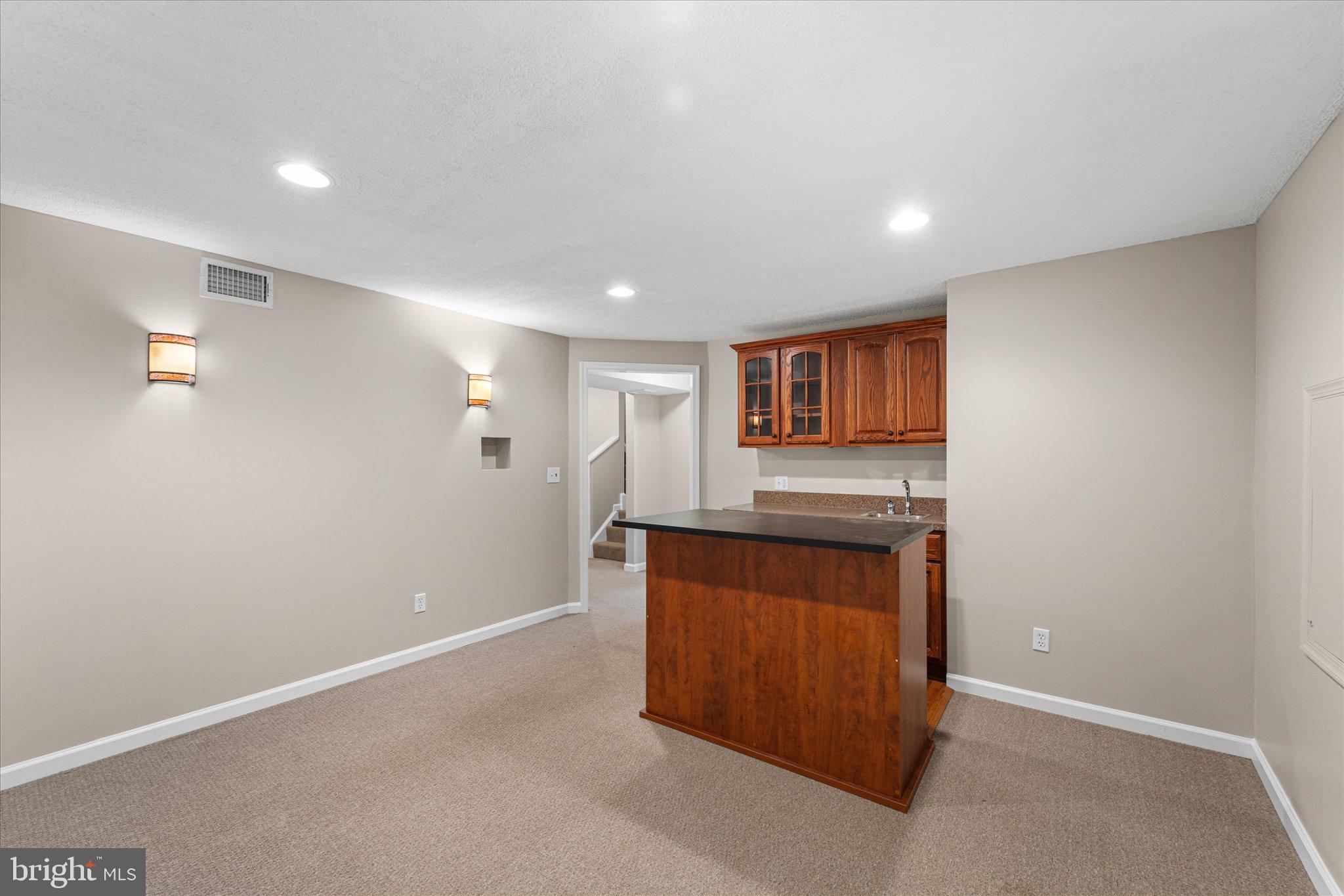 8104 Tall Timber Drive Gainesville, VA 20155 - Photo 38 of 58 Mini Fridge & bar area