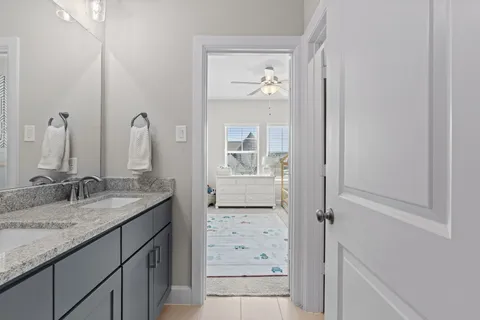 a bedroom with furniture and a window