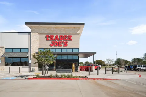 a front view of a building with street view