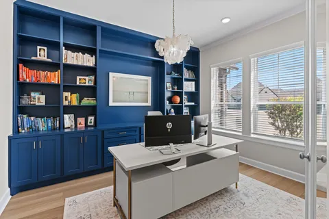 a view of a workspace with furniture