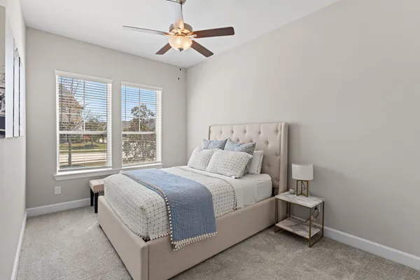 a living room with furniture kitchen view and a dining table