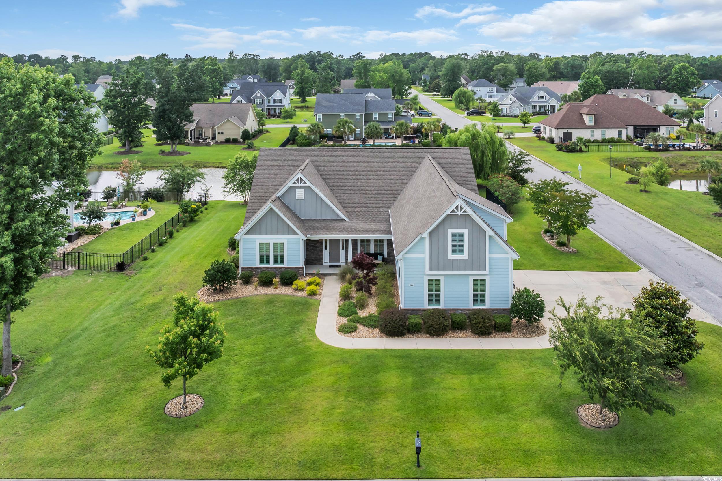 700 Shell Point Court Little River, SC 29566 - Photo 3 of 40 Aerial perspective of suburban area with a nearby body of water