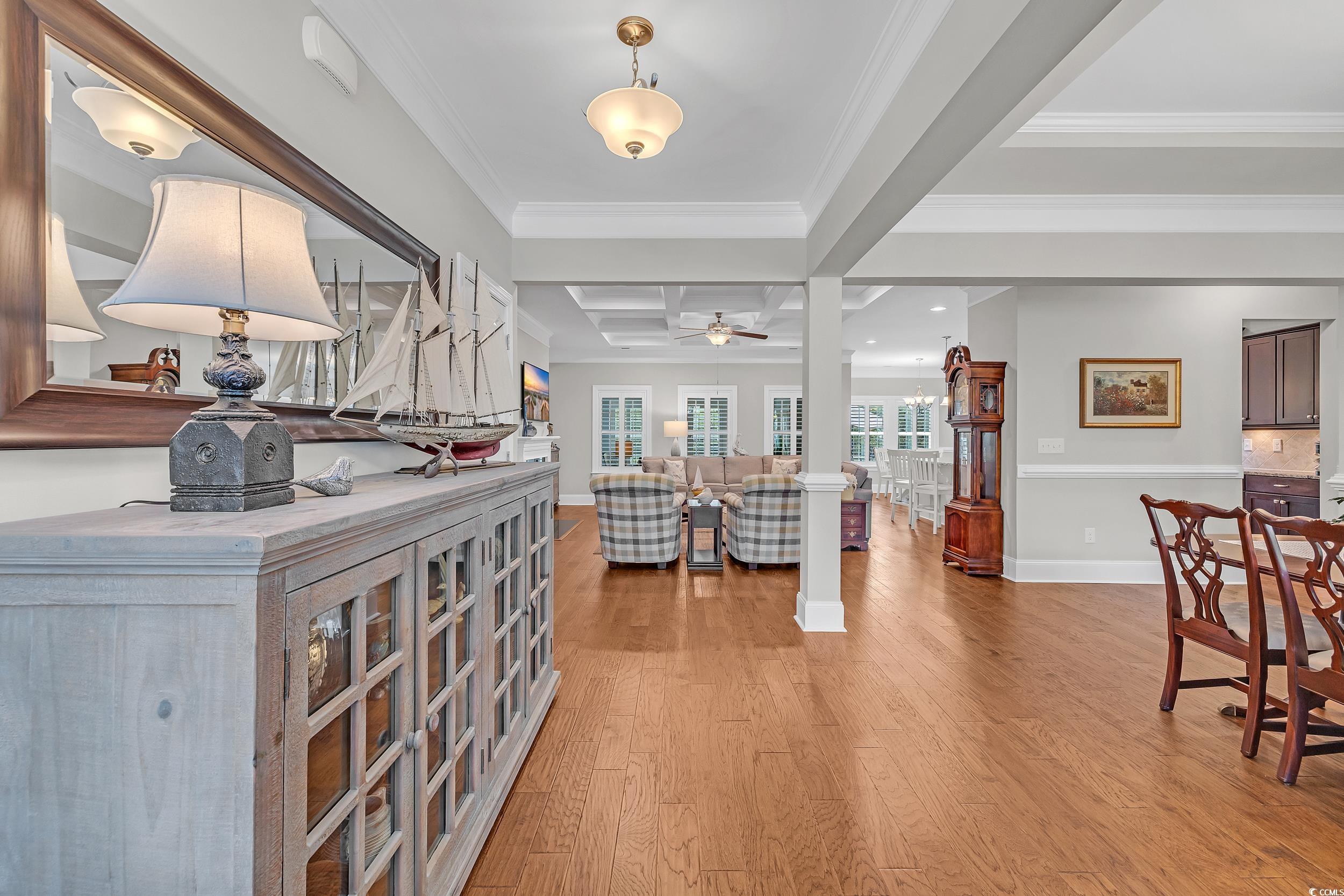 700 Shell Point Court Little River, SC 29566 - Photo 6 of 40 Entrance foyer with light wood-style flooring, coffered ceiling, ceiling fan, crown molding, and beam ceiling