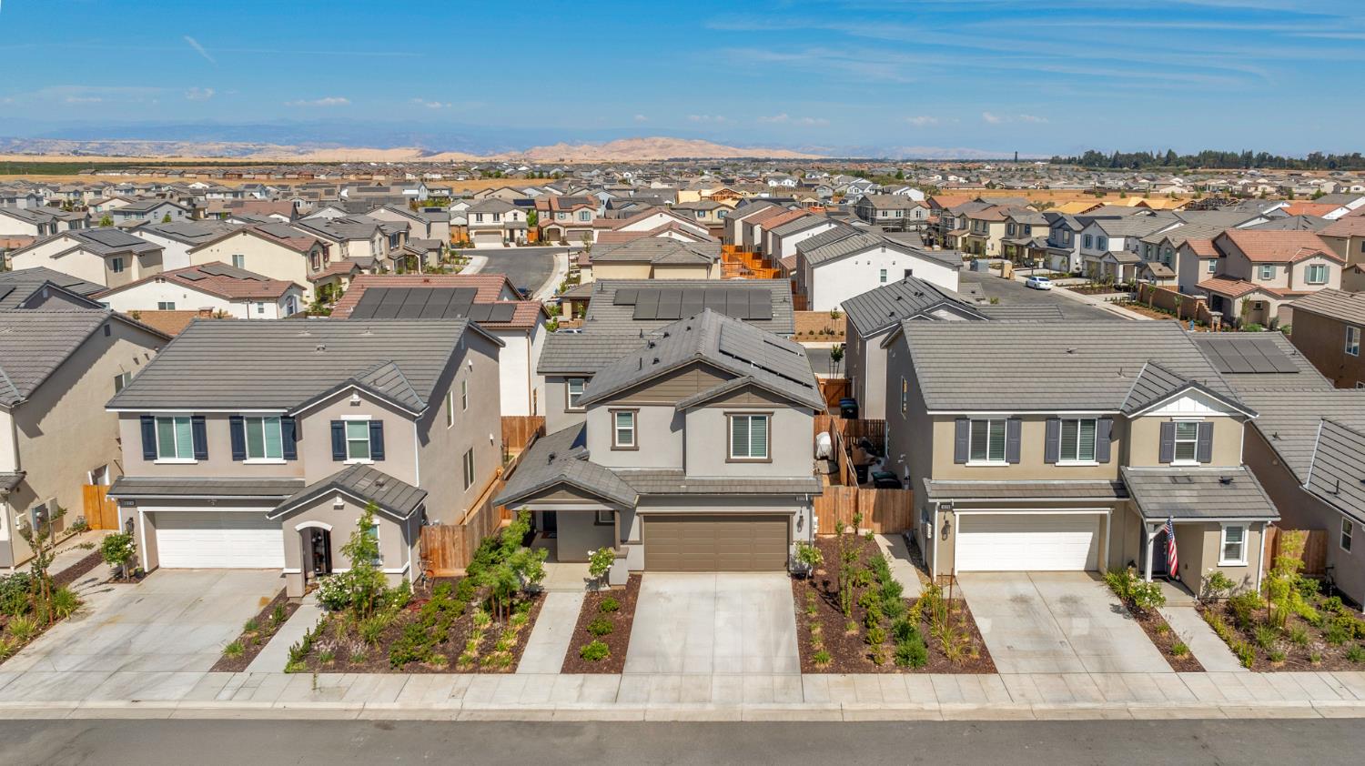 317 Talus Way South Madera, CA 93636 - Photo 2 of 61 an aerial view of residential houses with parking space