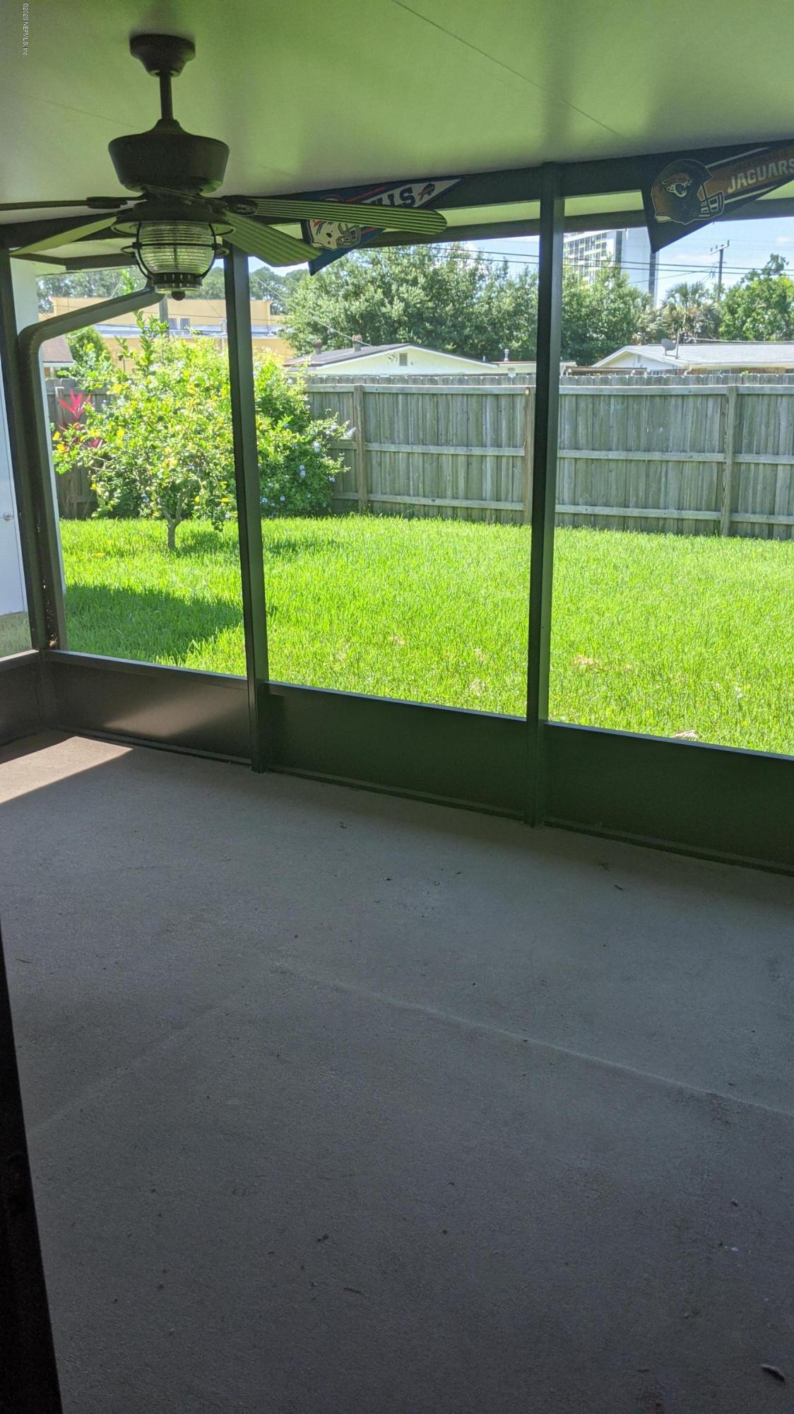 5712 Beney Road Jacksonville, FL 32207 - Photo 9 of 11 a view of an empty room with a window