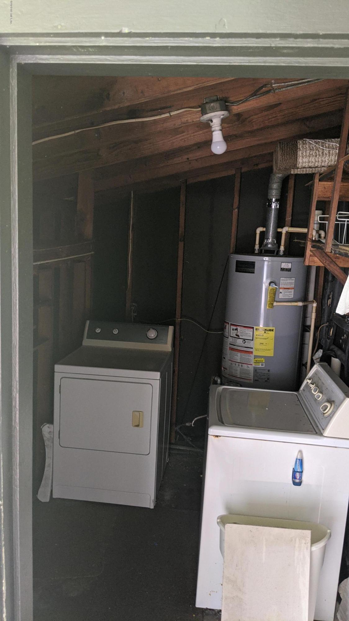 5712 Beney Road Jacksonville, FL 32207 - Photo 10 of 11 a utility room with washer and dryer