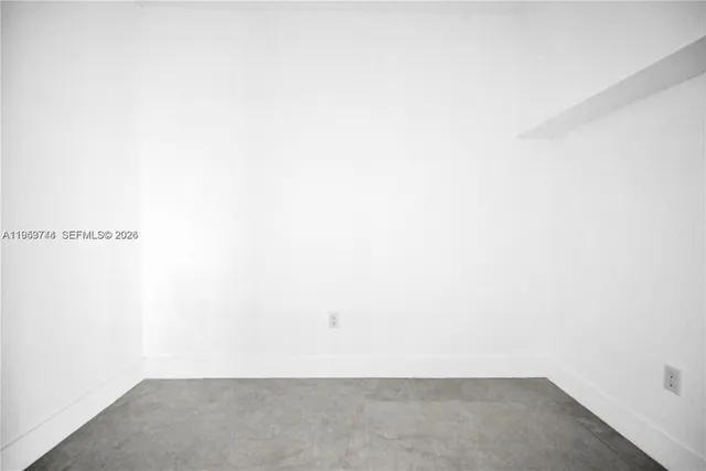 a view of a kitchen with a sink