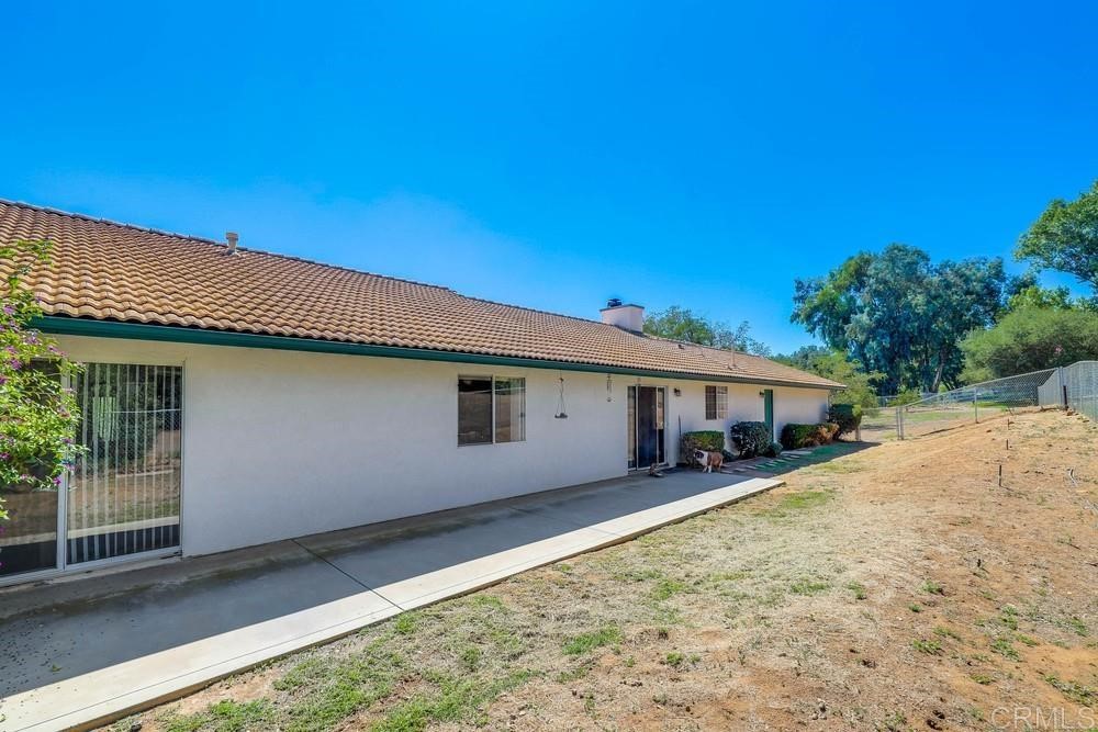 16651 Airmail Lane Ramona, CA 92065 - Photo 26 of 36 a house with yard in front of it