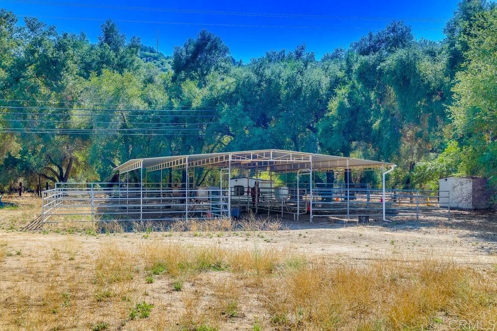16651 Airmail Lane Ramona, CA 92065 - Photo 33 of 36 a front view of a house with a yard