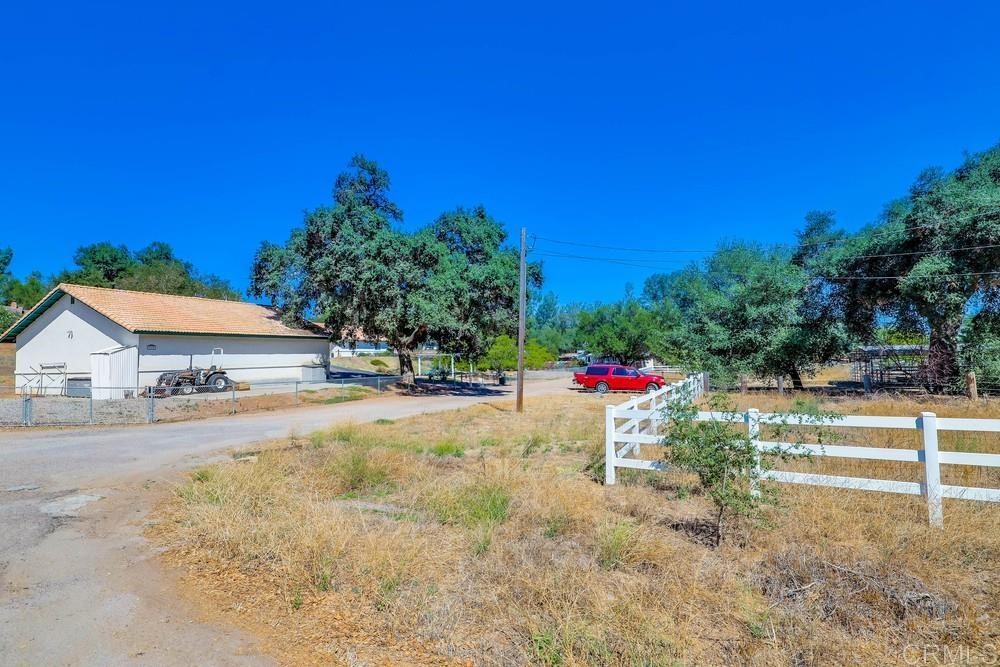 16651 Airmail Lane Ramona, CA 92065 - Photo 36 of 36 a view of a road with a house in the background
