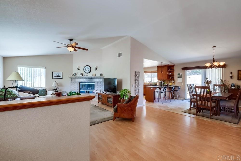 16651 Airmail Lane Ramona, CA 92065 - Photo 6 of 36 a living room with furniture and a fireplace