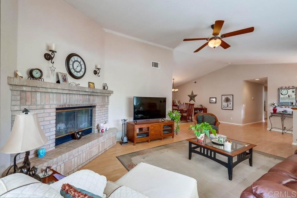 16651 Airmail Lane Ramona, CA 92065 - Photo 8 of 36 a living room with furniture and a fireplace