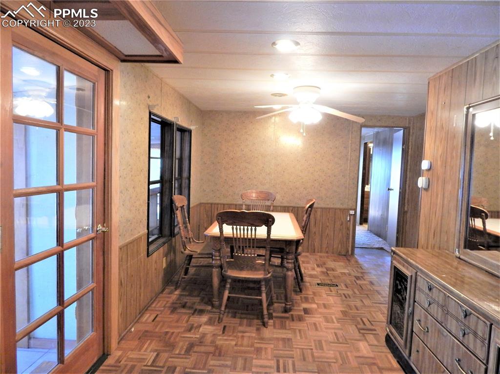 3220 Hoofprint Road Peyton, CO 80831 - Photo 3 of 22 a view of a dining room with furniture