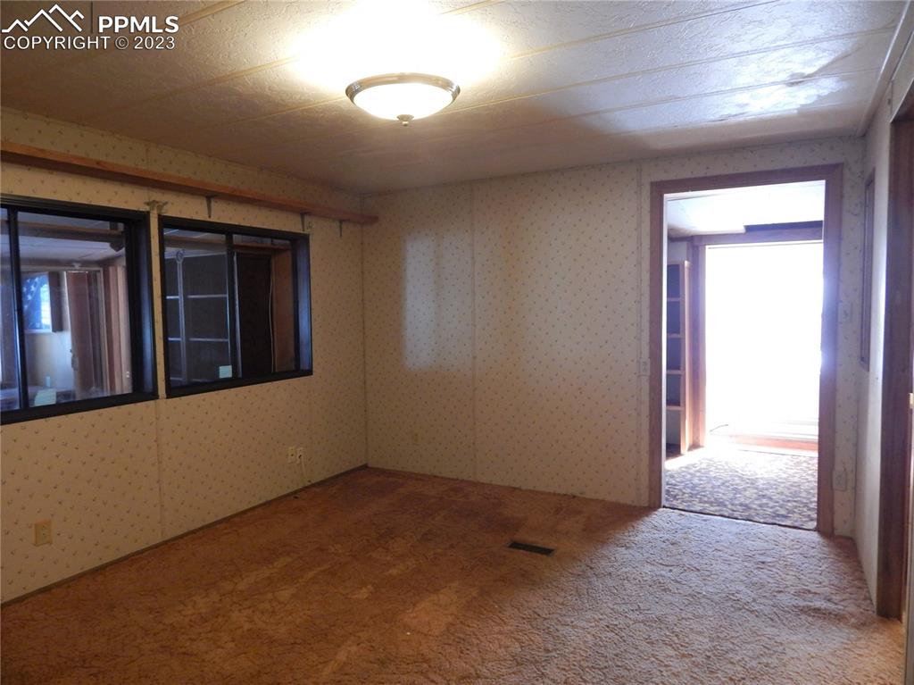 3220 Hoofprint Road Peyton, CO 80831 - Photo 7 of 22 a view of an empty room