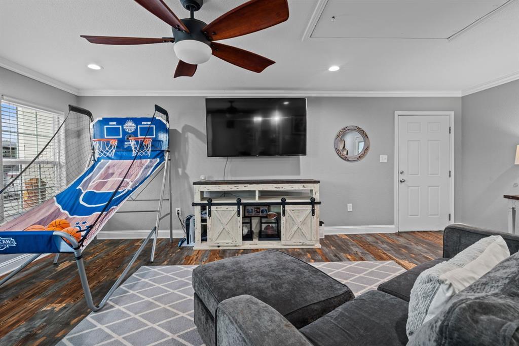 175 Porter Road Bartonville, TX 76226 - Photo 31 of 40 a living room with furniture and a flat screen tv