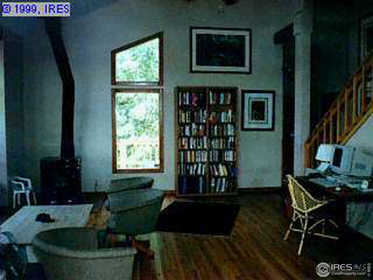 47 South Peak Road Boulder, CO 80302 - Photo 3 of 4 a living room with furniture and a window