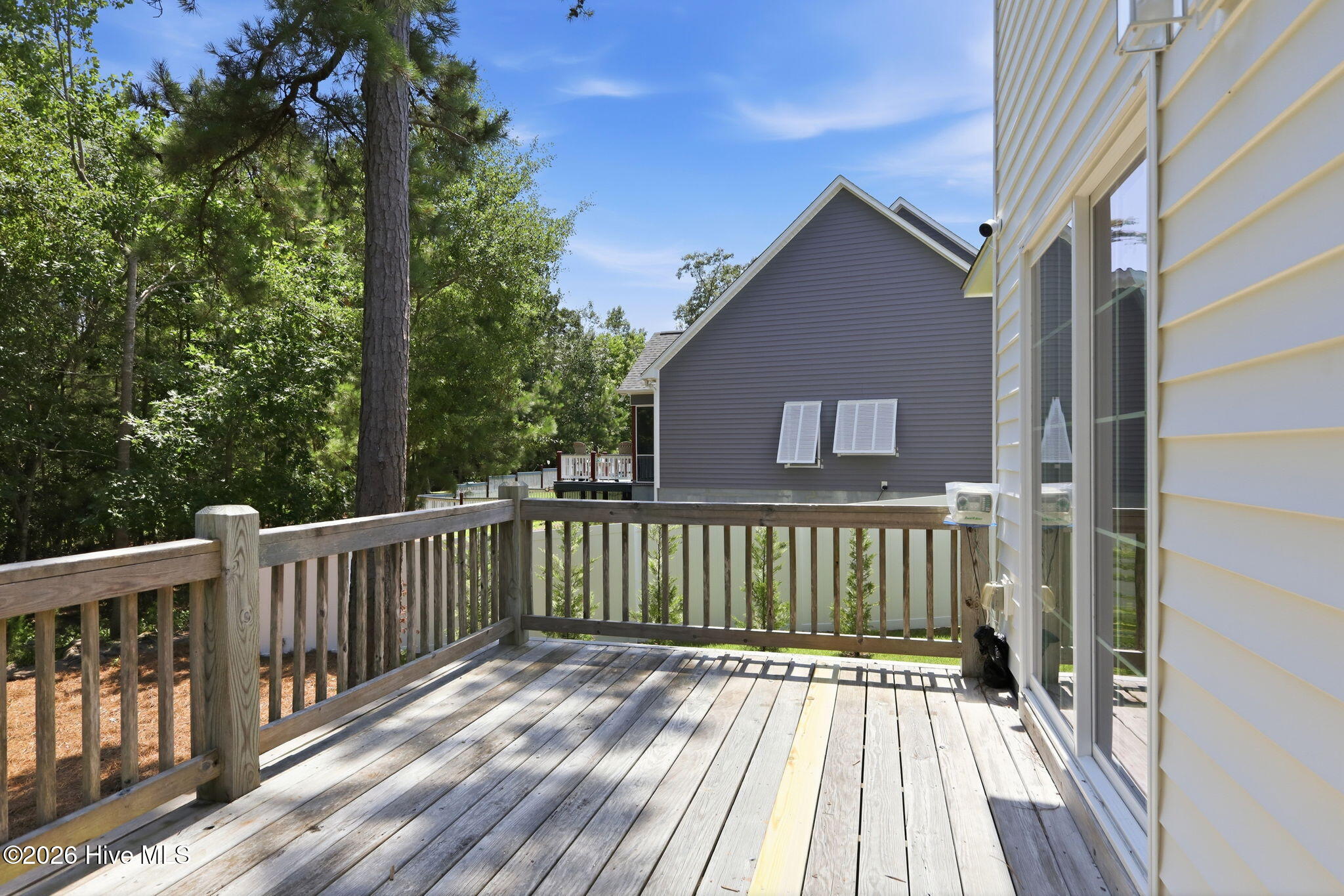 306 Oak Ridge Court Swansboro, NC 28584 - Photo 6 of 46 stairs lead down to backyard