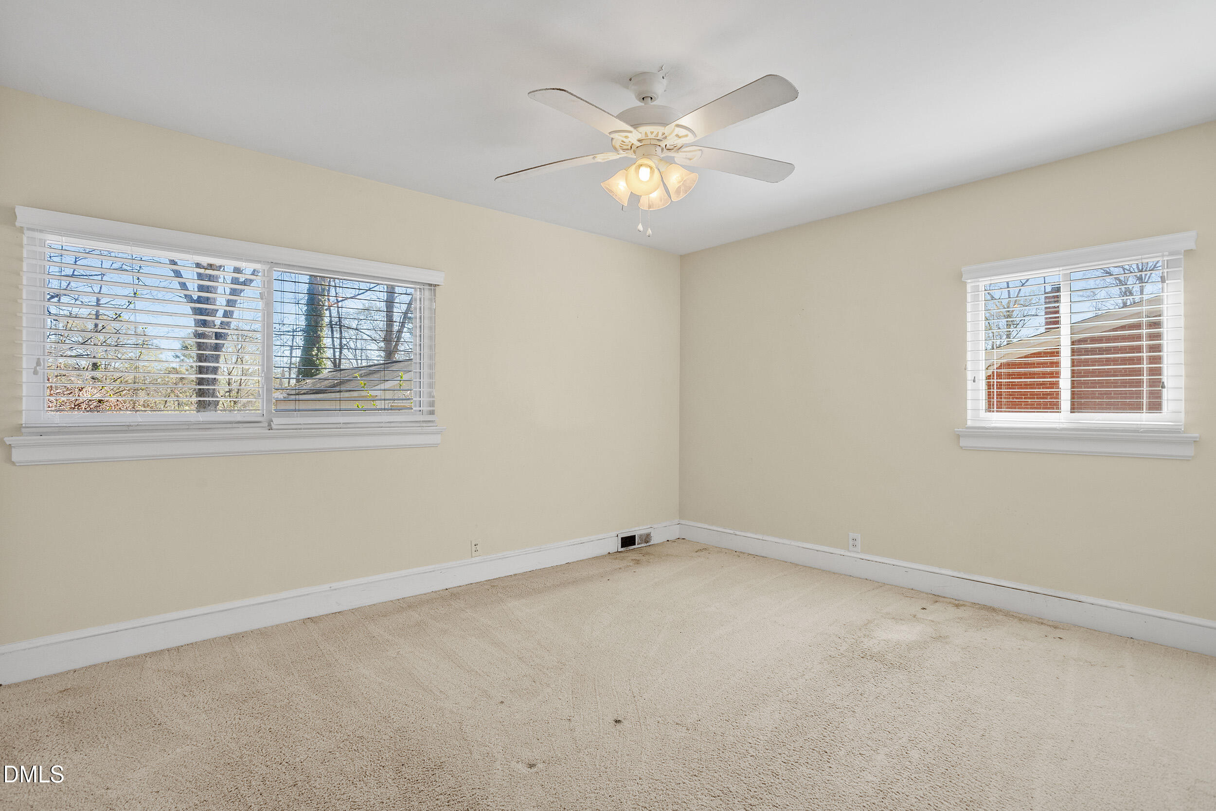 5011 Old Stage Road Raleigh, NC 27603 - Photo 19 of 29 an empty room with a window
