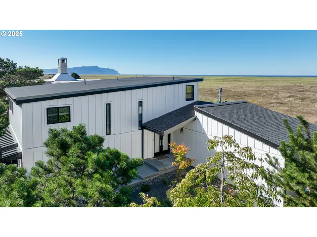 a black and white photo of a house