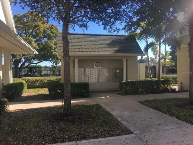 a view of a building with a yard