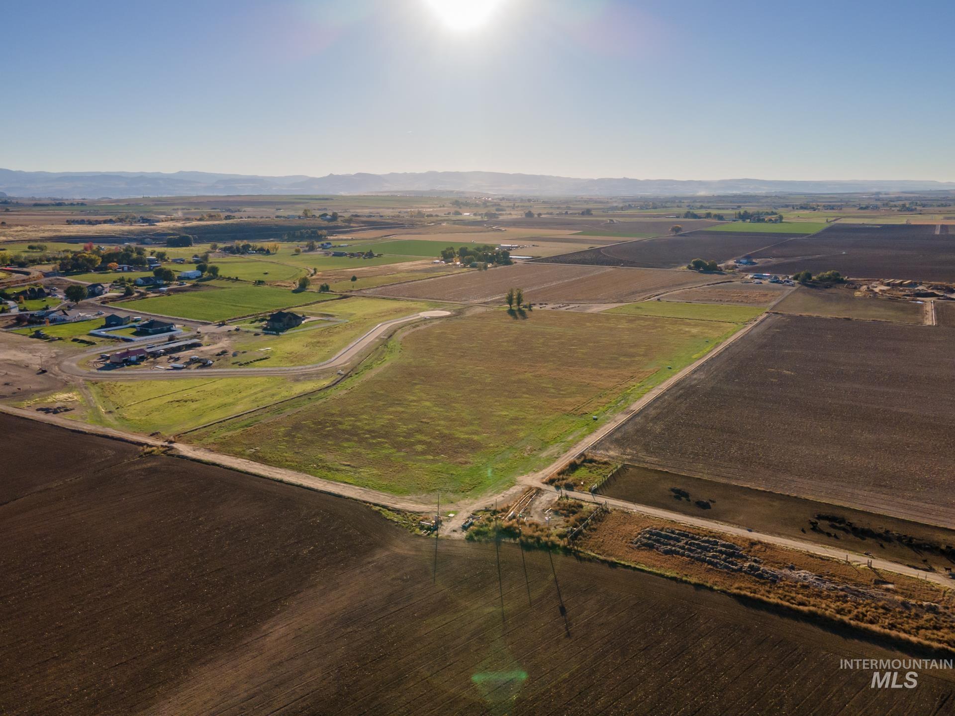 4350 West Mockingjay Kuna, ID 83634 - Photo 12 of 34 Aerial overview of property's location with rural landscape and extensive farmland