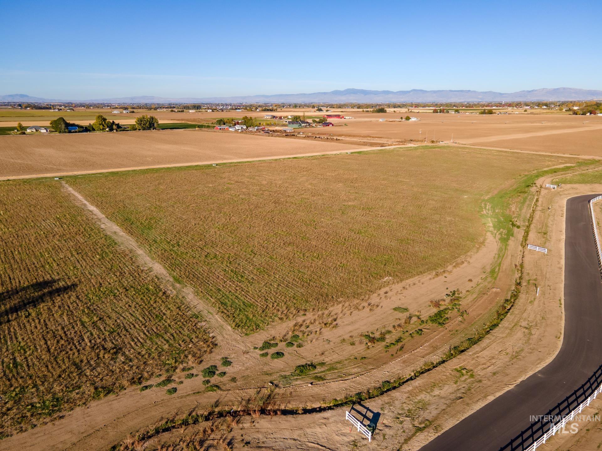4350 West Mockingjay Kuna, ID 83634 - Photo 16 of 34 View of property location with rural landscape, a mountain backdrop, and abundant farmland