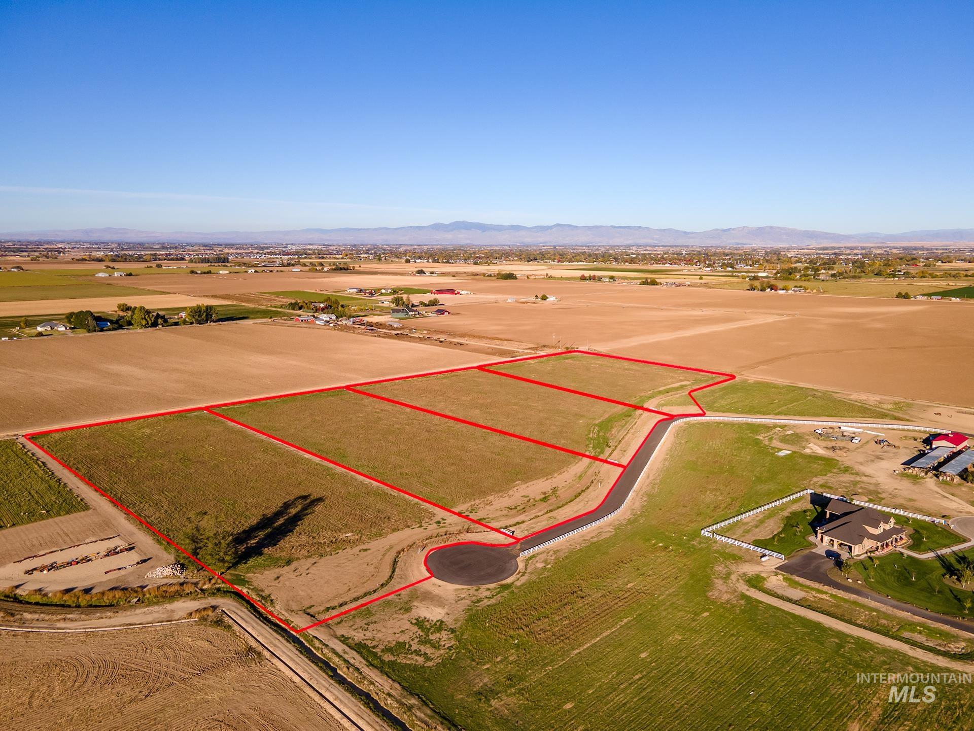 4350 West Mockingjay Kuna, ID 83634 - Photo 3 of 34 Overview of rural landscape featuring property boundaries highlighted and a mountain backdrop