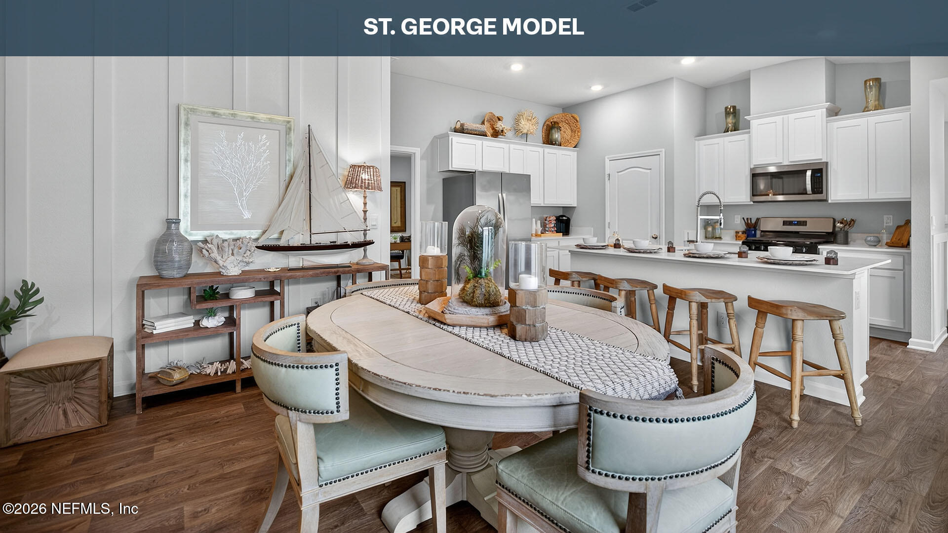 10 Mulligan Way Bunnell, FL 32110 - Photo 11 of 52 a kitchen with stainless steel appliances a table and chairs in it