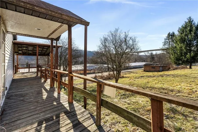 a view of a swimming pool with a patio