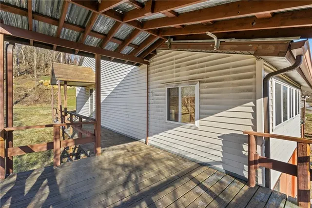a view of a balcony with chairs
