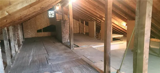a view of a brick house with a glass door