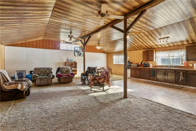 a view of a garage with parked cars